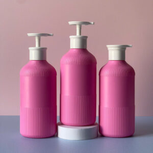 Chai Nhựa HDPE Hồng Đậm Sọc Vòi Nhấn Dẹp Trắng 500ml